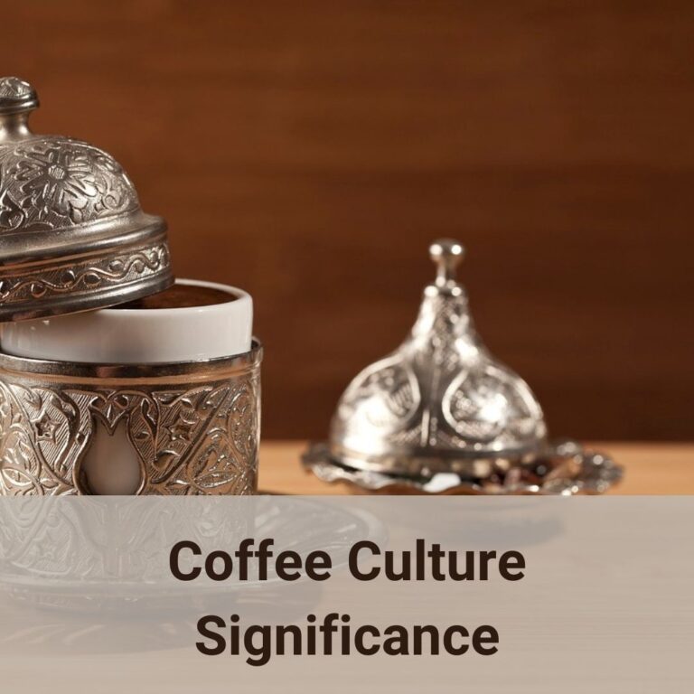 This picture shows a set of Turkish Coffee cups. A white ceramic coffee cup is housed in a silver cup sleeve with matching silver saucer. The sleeve has a matching cap which keeps the coffee hot is half opened and rested on the cup sleeve handle. In the background, out of focus is a silver dish with matching lid under which the Turkish delight is. The cultrual significance of coffee varies from region to region.